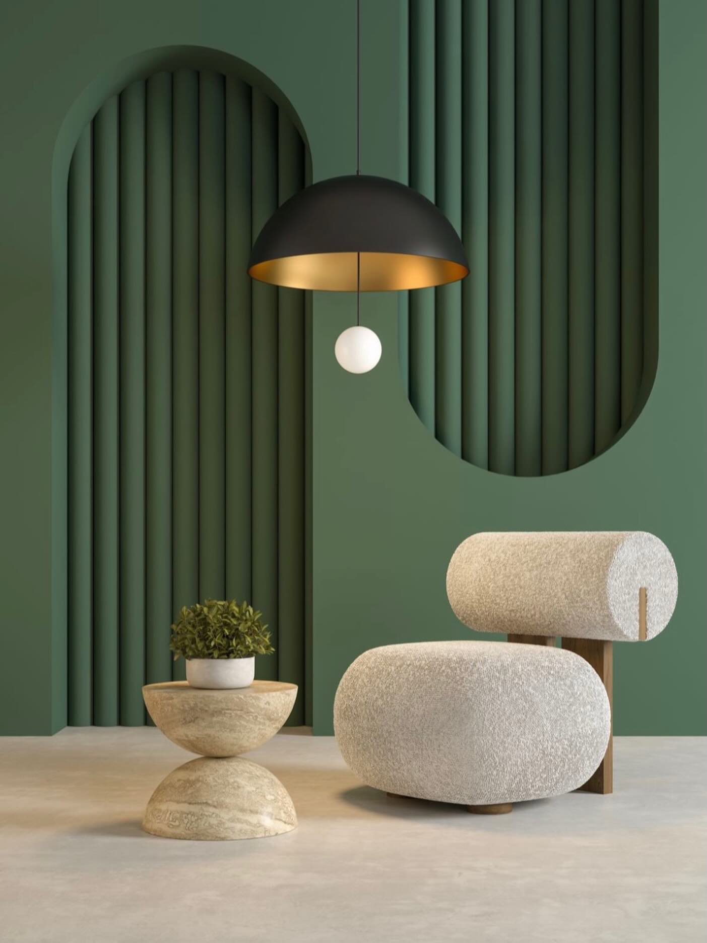 Green fluted feature wall with boucle lounge chair and travertine side table